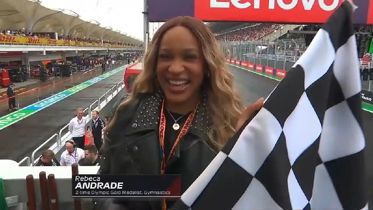 Rebeca Andrade faz bandeirada para Lewis Hamilton no GP Brasil e homenageia Ayrton Senna